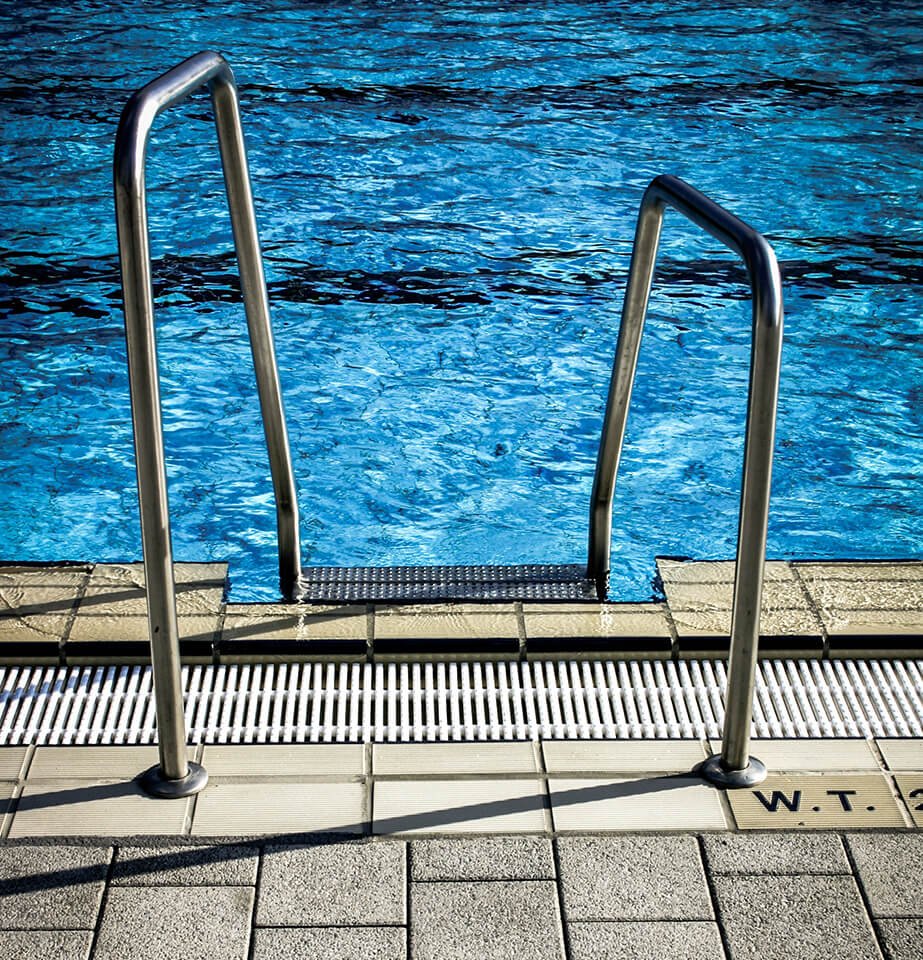 pool ladder - blue swimming pool scene